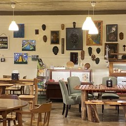 tables and chairs in a coffee shop