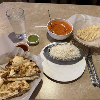 Star Indian cuisine - Chicken Tikka Masala with rice, pampad, and butter naan. - Indian Near Me - Omaha, Nebraska Star Indian cuisine - Chicken Tikka Masala with rice, pampad, and butter naan. - Indian Near Me - Omaha, Nebraska