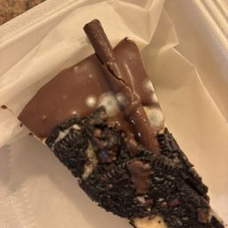 Cheesecake I got in a to go order. Spoke with the manager 2x. Did nothing to make it right. Put in on uber eats to comp $9 off my bill. Cheesecake I got in a to go order. Spoke with the manager 2x. Did nothing to make it right. Put in on uber eats to comp $9 off my bill.