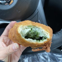 Turnover with spinach, cheese, onion and spices. Turnover with spinach, cheese, onion and spices.