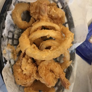 Tasty Crab House - Onion rings and shrimp had eaten half the basket before pic - Seafood Near Me - North Charleston, South Carolina
