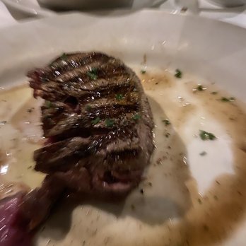 Morton's The Steakhouse - Filet mignon with truffle butter. Totally recommend ordering the truffle butter. I ordered blue rare. Perfect! - Steakhouses Near Me - Honolulu, Hawaii Morton's The Steakhouse - Filet mignon with truffle butter. Totally recommend ordering the truffle butter. I ordered blue rare. Perfect! - Steakhouses Near Me - Honolulu, Hawaii