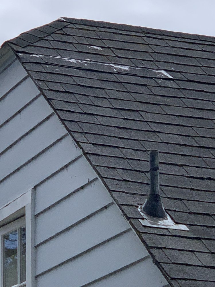 Slide of Astro Roofing