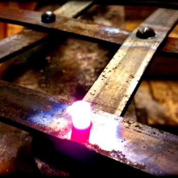 Napa Valley Custom Metal - hand riveting a fire screen medieval style- over 150 rivets and each one is unique in appearance and exceptionally strong... - Home Decor Near Me - Napa, California Napa Valley Custom Metal - hand riveting a fire screen medieval style- over 150 rivets and each one is unique in appearance and exceptionally strong... - Home Decor Near Me - Napa, California