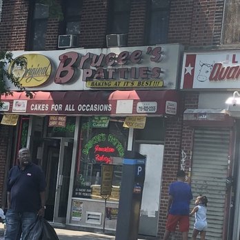 The Original Brucee's Patties - people walking on the sidewalk - Bakeries Near Me - Brooklyn, New York