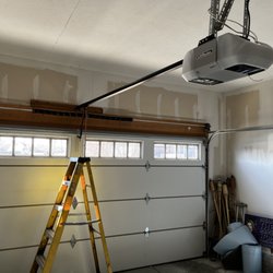 Over The Top Garage Service - Overhead opener replacement.