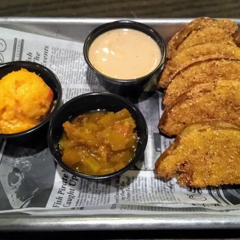 The Row - Fried green tomatoes with Peppadew pimento cheese, chow chow, and Row sauce. - Southern Near Me - Nashville, Tennessee The Row - Fried green tomatoes with Peppadew pimento cheese, chow chow, and Row sauce. - Southern Near Me - Nashville, Tennessee