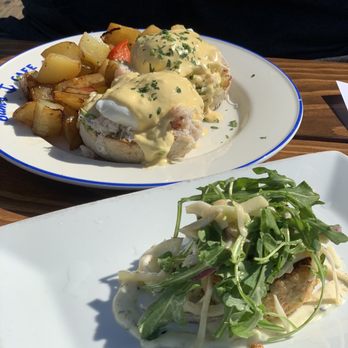Sam's Anchor Cafe - 1 small crab cake in the foreground ($20) with crab Benedict ($26) in the background. March 2021 - Seafood Near Me - Tiburon, California Sam's Anchor Cafe - 1 small crab cake in the foreground ($20) with crab Benedict ($26) in the background. March 2021 - Seafood Near Me - Tiburon, California