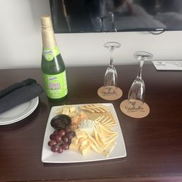 Our $40 cheese plate and "nonalcoholic bubbly" Our $40 cheese plate and "nonalcoholic bubbly"