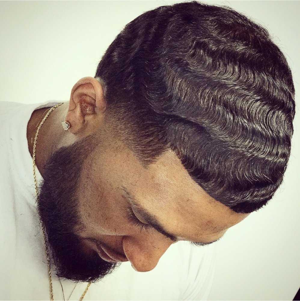 Ruben's Barber Studio Logo