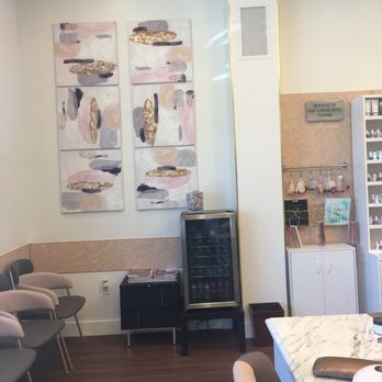 Bliss Powder Nail Bar - Part of the waiting area with their mini fridge, lollipops, and color sample section! - Nail Salons Near Me - American Fork, Utah
