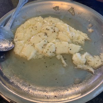 Players Restaurant Lounge - Saganaki half eaten, ha! - Steakhouses Near Me - Warrensburg, Missouri