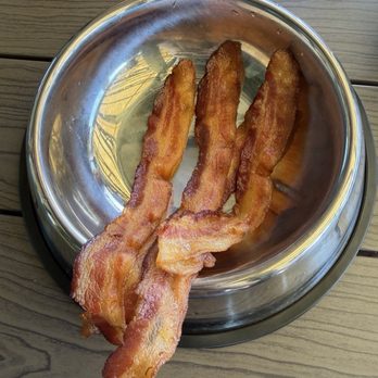 Tupelo Honey - dog menu bacon slices - New American Near Me - Lenexa, Kansas