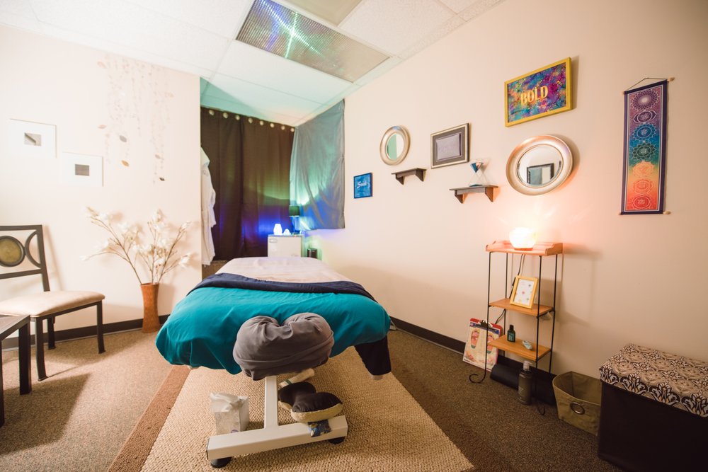 Behind These Hands Healing Center Logo
