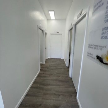 RCM Mobile Massage - Hallway leading to the massage rooms and the bathroom is last door on the left side of photo. Very clean bathroom. - Massage Therapy Near Me RCM Mobile Massage - Hallway leading to the massage rooms and the bathroom is last door on the left side of photo. Very clean bathroom. - Massage Therapy Near Me