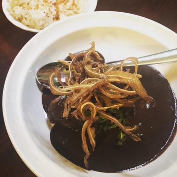 Musang Seattle - Dinuguan with pork cheeks and crispy pig ears. - Filipino Near Me - Seattle, Washington Musang Seattle - Dinuguan with pork cheeks and crispy pig ears. - Filipino Near Me - Seattle, Washington