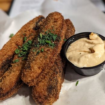 The Walrus - a plate of fried fish with a side of dip - Bars Near Me - Columbus, Ohio The Walrus - a plate of fried fish with a side of dip - Bars Near Me - Columbus, Ohio