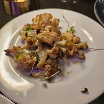 Lounge At Greer Caberet Theater - 1/2 of the new charred cauliflower appetizer ... has lemon oil and labneh - Lounges Near Me - Pittsburgh, Pennsylvania Lounge At Greer Caberet Theater - 1/2 of the new charred cauliflower appetizer ... has lemon oil and labneh - Lounges Near Me - Pittsburgh, Pennsylvania