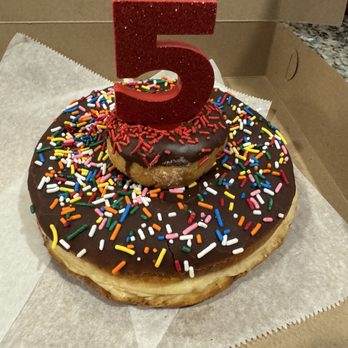Sesame Donuts - King sized donut with a regular donut & the birthday candle - Donuts Near Me - San Diego, California Sesame Donuts - King sized donut with a regular donut & the birthday candle - Donuts Near Me - San Diego, California