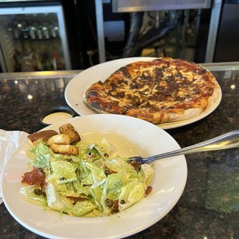 The Ranch Sports Grill - Half Caesar and a ground beef pizza. $12 lunch special. So impressive and delicious - American Near Me - Ladera Ranch, California