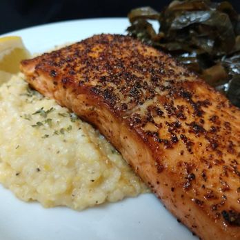 Old Edgefield Grille - Blackened Salmon with side of grits and collards - Southern Near Me - Edgefield, South Carolina Old Edgefield Grille - Blackened Salmon with side of grits and collards - Southern Near Me - Edgefield, South Carolina