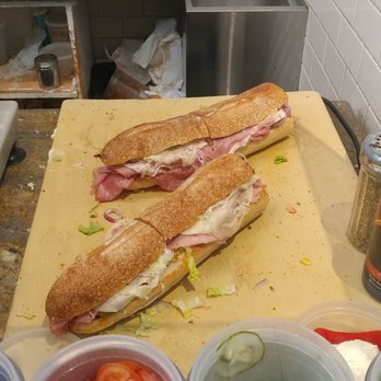 Monica's Mercato - Two large Italians being finished up - Italian Near Me - Boston, Massachusetts