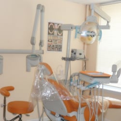 Yelena Ustinina, DDS, PC - The main operating room. It's very bright, clean, and pleasant to sit in.