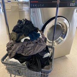 Cart full of wet laundry Cart full of wet laundry