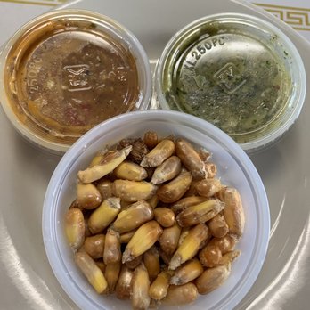 Andes Peruvian Cuisine - Complimentary crispy corn kernels and hot sauces - Peruvian Near Me - Phoenix, Arizona