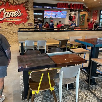 Raising Cane's Chicken Fingers - Counter and dining area - Chicken Shop Near Me - Clearwater, Florida Raising Cane's Chicken Fingers - Counter and dining area - Chicken Shop Near Me - Clearwater, Florida