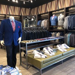 DXL Men's Apparel - Club area. Suits