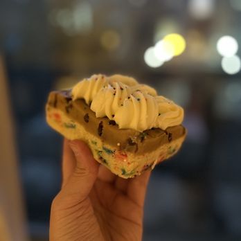 Sweet Box Cupcakes - a hand holding a pastry - Bakeries Near Me - Philadelphia, Pennsylvania Sweet Box Cupcakes - a hand holding a pastry - Bakeries Near Me - Philadelphia, Pennsylvania