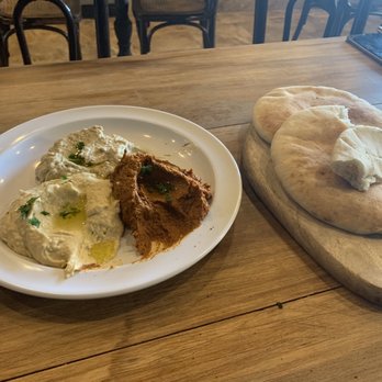 Zatar - Variety starter: hummus babaganush and Msomething lol with Pita Bread - Middle Eastern Near Me - Brooklyn, New York Zatar - Variety starter: hummus babaganush and Msomething lol with Pita Bread - Middle Eastern Near Me - Brooklyn, New York