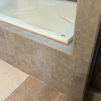 Flaherty built - Cannot even tell it was touched - new grout was a perfect match too - General Contractors Near Me