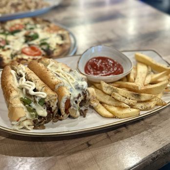Roma's Italian Restaurant - Philly Cheese Steak Sub - Pizza Near Me - Prosper, Texas Roma's Italian Restaurant - Philly Cheese Steak Sub - Pizza Near Me - Prosper, Texas