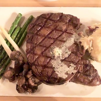 Hugo's Cellar - Ribeye Steak with Garlic Mash and Asparagus Spears and Mushrooms - American Near Me - Las Vegas, Nevada Hugo's Cellar - Ribeye Steak with Garlic Mash and Asparagus Spears and Mushrooms - American Near Me - Las Vegas, Nevada