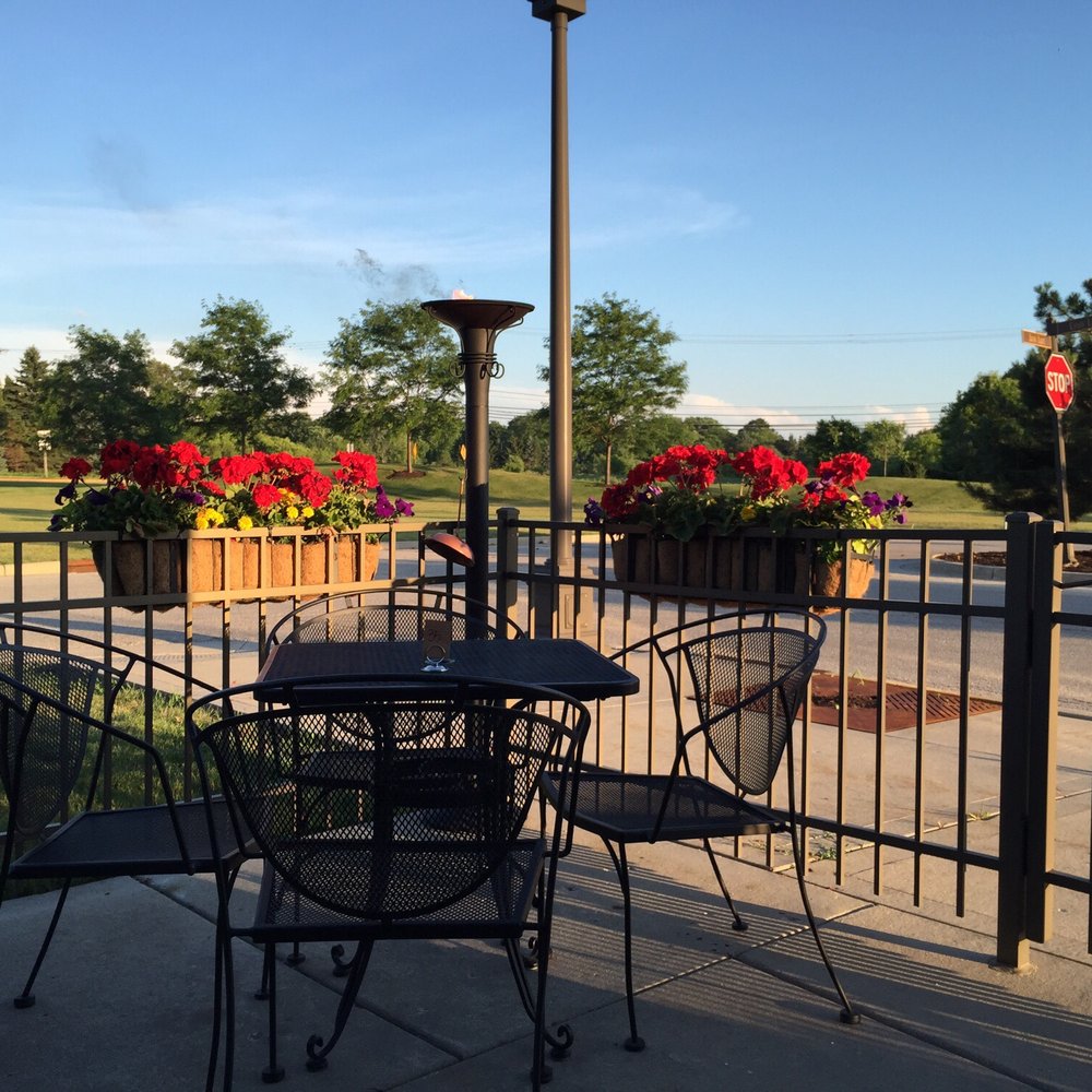 Ally's Bistro - Outside patio on a Friday. Lit tiki torches. - Cafes Near Me - Menomonee Falls, Wisconsin Ally's Bistro - Outside patio on a Friday. Lit tiki torches. - Cafes Near Me - Menomonee Falls, Wisconsin