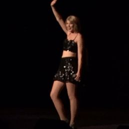 a woman dancing on stage