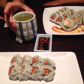 SUSHIRAW - Spicy tuna roll plate in front, along with spicy tuna and shrimp rolls on the right - Japanese Near Me - Granada Hills, California
