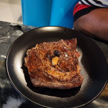 Cameals Cuisine - Herb Marinated Ribeye (medium)...not overcooked and seasoned well. - Caribbean Near Me - Loganville, Georgia