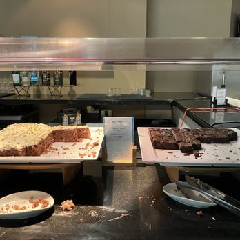 The Club SEA - Baked goods station - carrot cake and brownies - Airport Lounges Near Me - Seattle, Washington The Club SEA - Baked goods station - carrot cake and brownies - Airport Lounges Near Me - Seattle, Washington