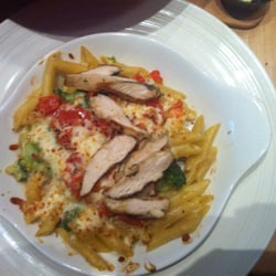 East Side Mario's - Broccoli, tomato parmesean cheese baked penne with chicken... Noms!