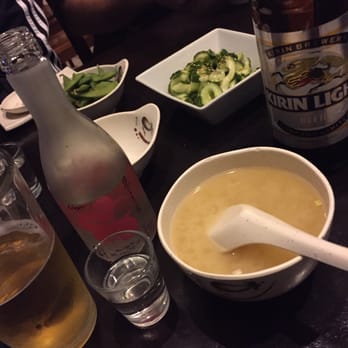 Kazoku - Complimentary miso and edename. Cucumber salad and sake and Kirin in the background - Sushi Bars Near Me - Tucson, Arizona Kazoku - Complimentary miso and edename. Cucumber salad and sake and Kirin in the background - Sushi Bars Near Me - Tucson, Arizona