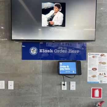 Nick the Greek - Order kiosk! Music playing thru flat screen tv - Salad Near Me - Ontario, California Nick the Greek - Order kiosk! Music playing thru flat screen tv - Salad Near Me - Ontario, California
