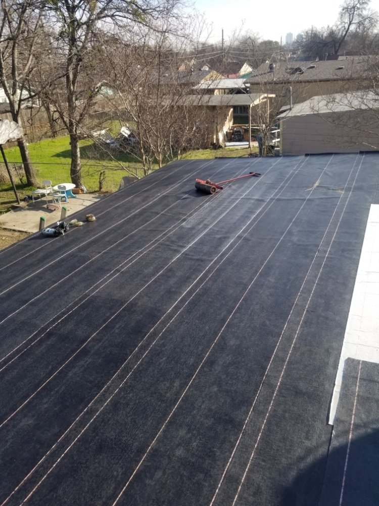 Slide of Kiaas Roofing