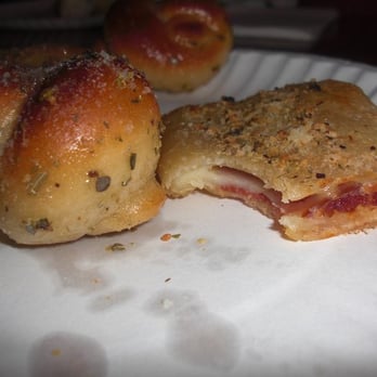 Brooklyn Pizza - Roll and twist up close. - Pizza Near Me - Birmingham, Michigan