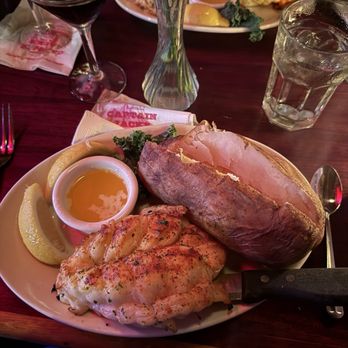 Captain Jack's - Lobster with baked potatoe - Seafood Near Me - Sunset Beach, California Captain Jack's - Lobster with baked potatoe - Seafood Near Me - Sunset Beach, California