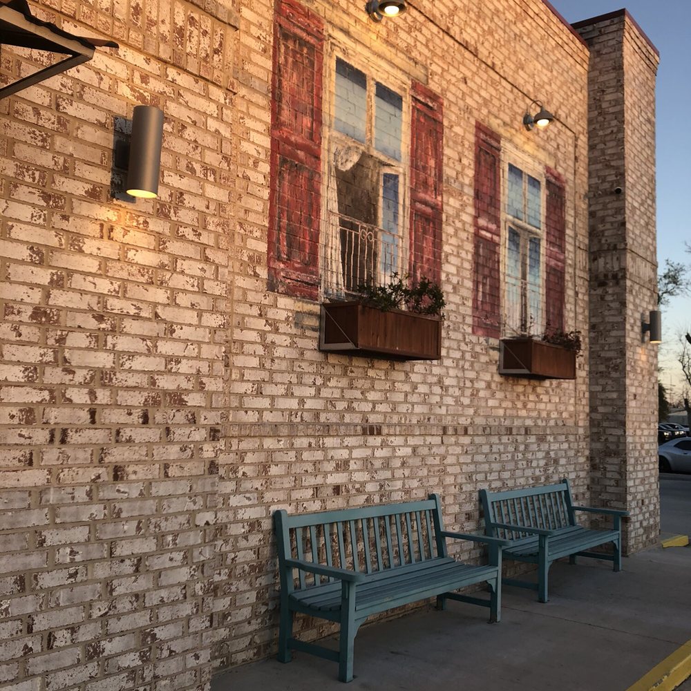 Shwarmas - a brick building with red shutters - Lebanese Near Me - Lake Charles, Louisiana Shwarmas - a brick building with red shutters - Lebanese Near Me - Lake Charles, Louisiana