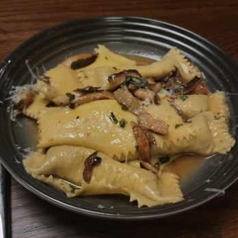Colletta - Agnolotti: Braised Short Ribs, Ricotta, Roasted Mushrooms, Red Wine Au jus, Pecorino and Herb Gremolotta - Italian Near Me - Cary, North Carolina Colletta - Agnolotti: Braised Short Ribs, Ricotta, Roasted Mushrooms, Red Wine Au jus, Pecorino and Herb Gremolotta - Italian Near Me - Cary, North Carolina