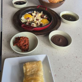 Baklava Home - Eggs with Sausage (Sujuk), Cheese pastry, Sauces: Nutella, Cherry jam, Tomatoes Walnut paste (Muhammara) and oil with sesame seeds (Halva) - Desserts Near Me - Edgewater, New Jersey